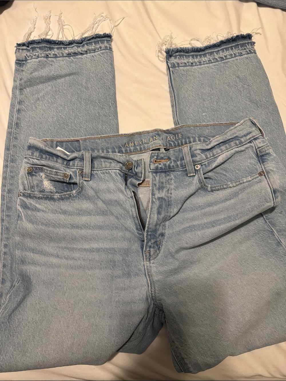 American Eagle Outfitters Light Wash Distressed Frayed Hem Jeans